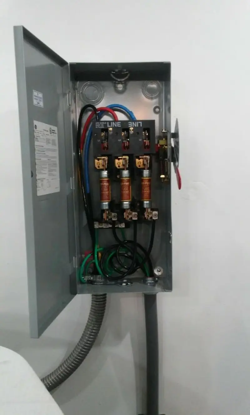 Three-phase disconnect switch installed for Smoke Detector Installation in Cornelius